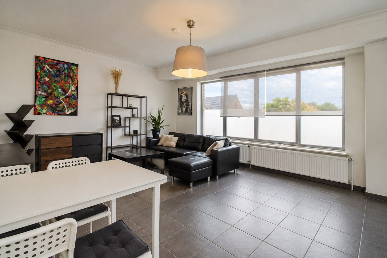 Te koop: Lichtrijk en instapklaar 2-slaapkamerappartement met terras en EPC-label C op gunstige ligging in Sint-Niklaas! 