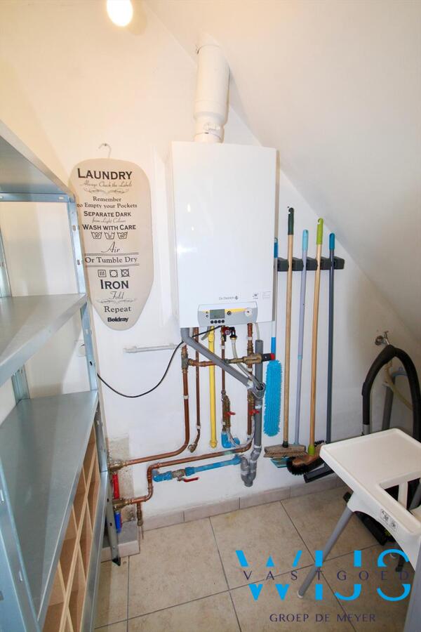 Gezellige 2 slaapkamerduplex mét garage 