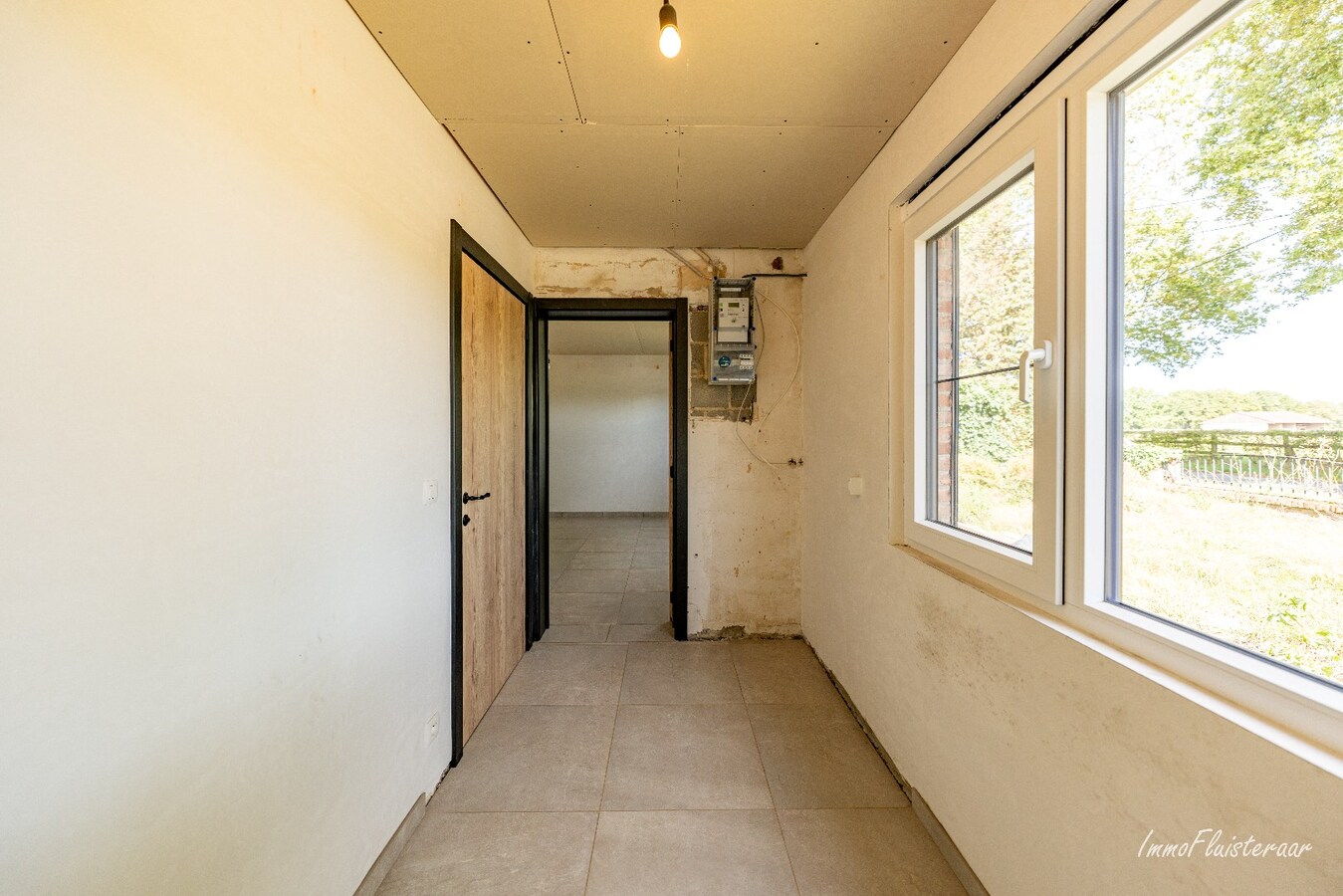 Gerenoveerde woning met praktijkruimte en paardenstal op 9.019 m2 te Balen 