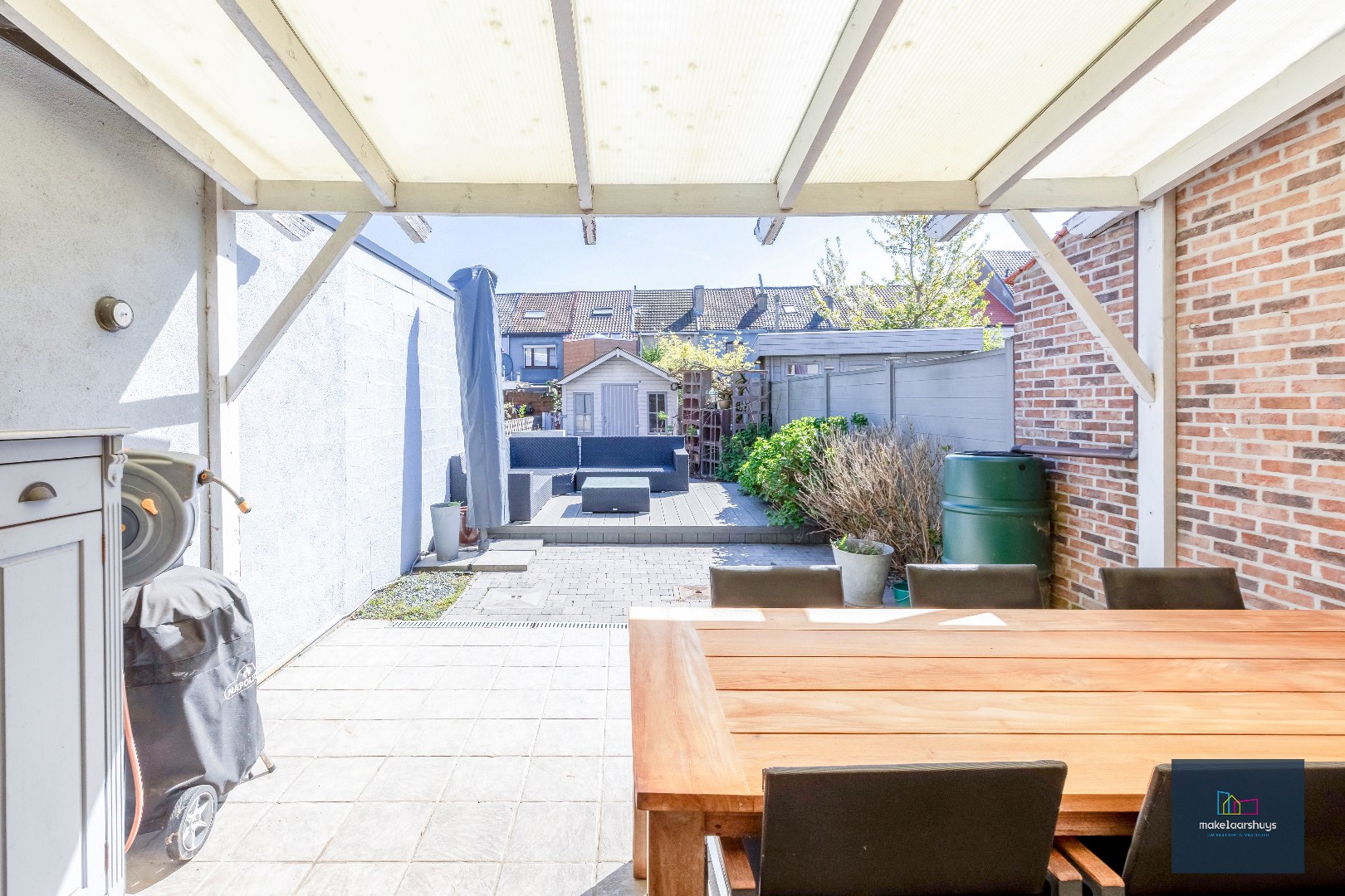 Goed onderhouden en ruime woning in rij met tuin/terras te Wondelgem 