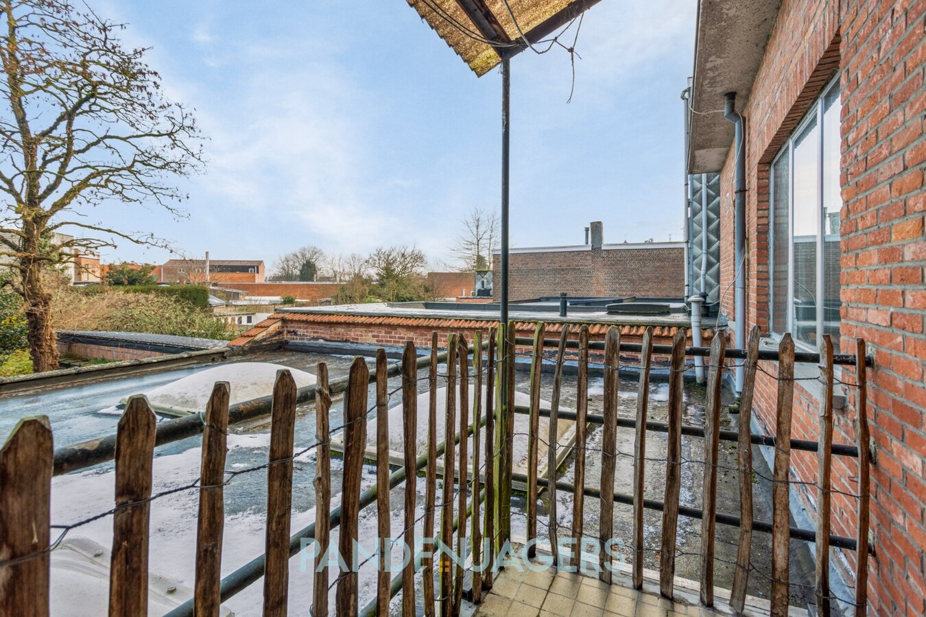 Handelshuis met winkelgedeelte en appartement te Duffel 