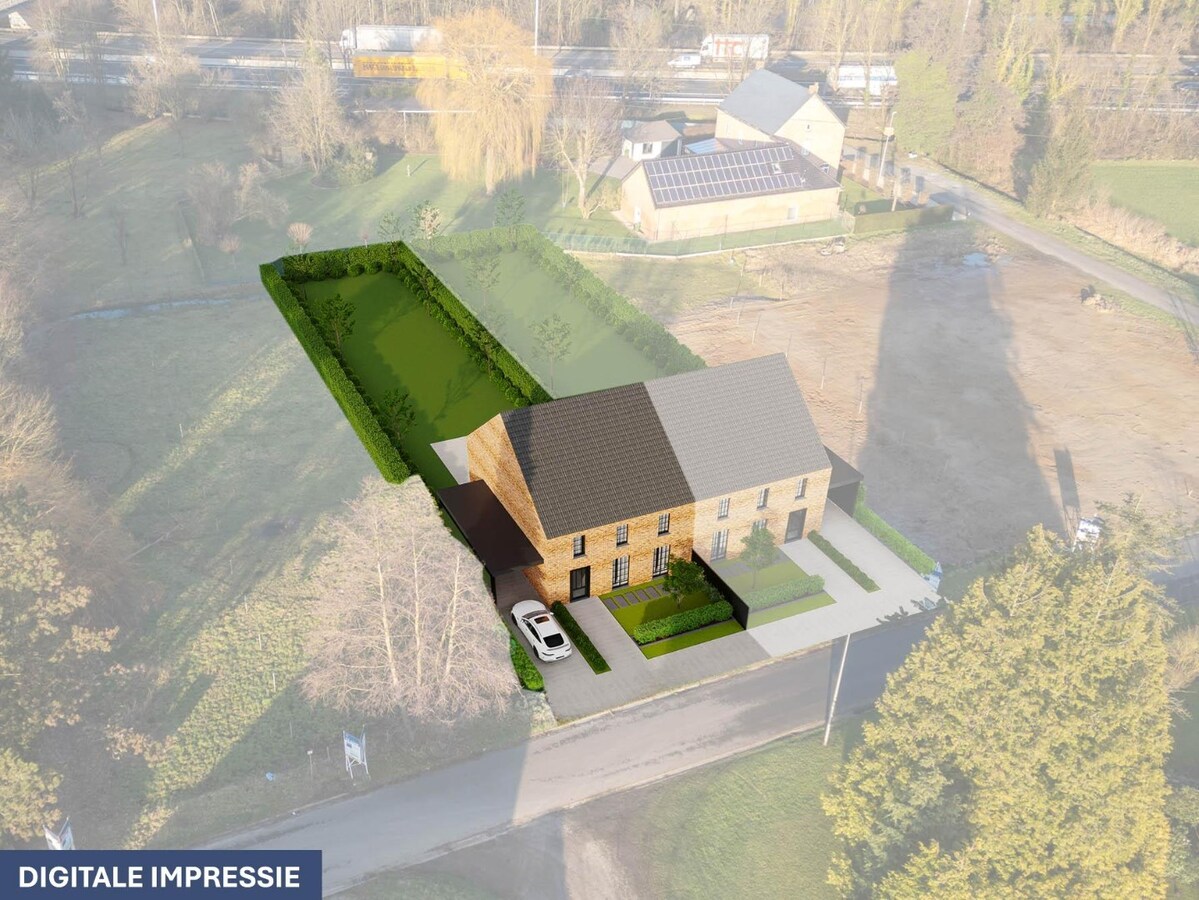 Ruime bouwgrond voor een half open bebouwing, gelegen op een perceel van 7a74ca. 