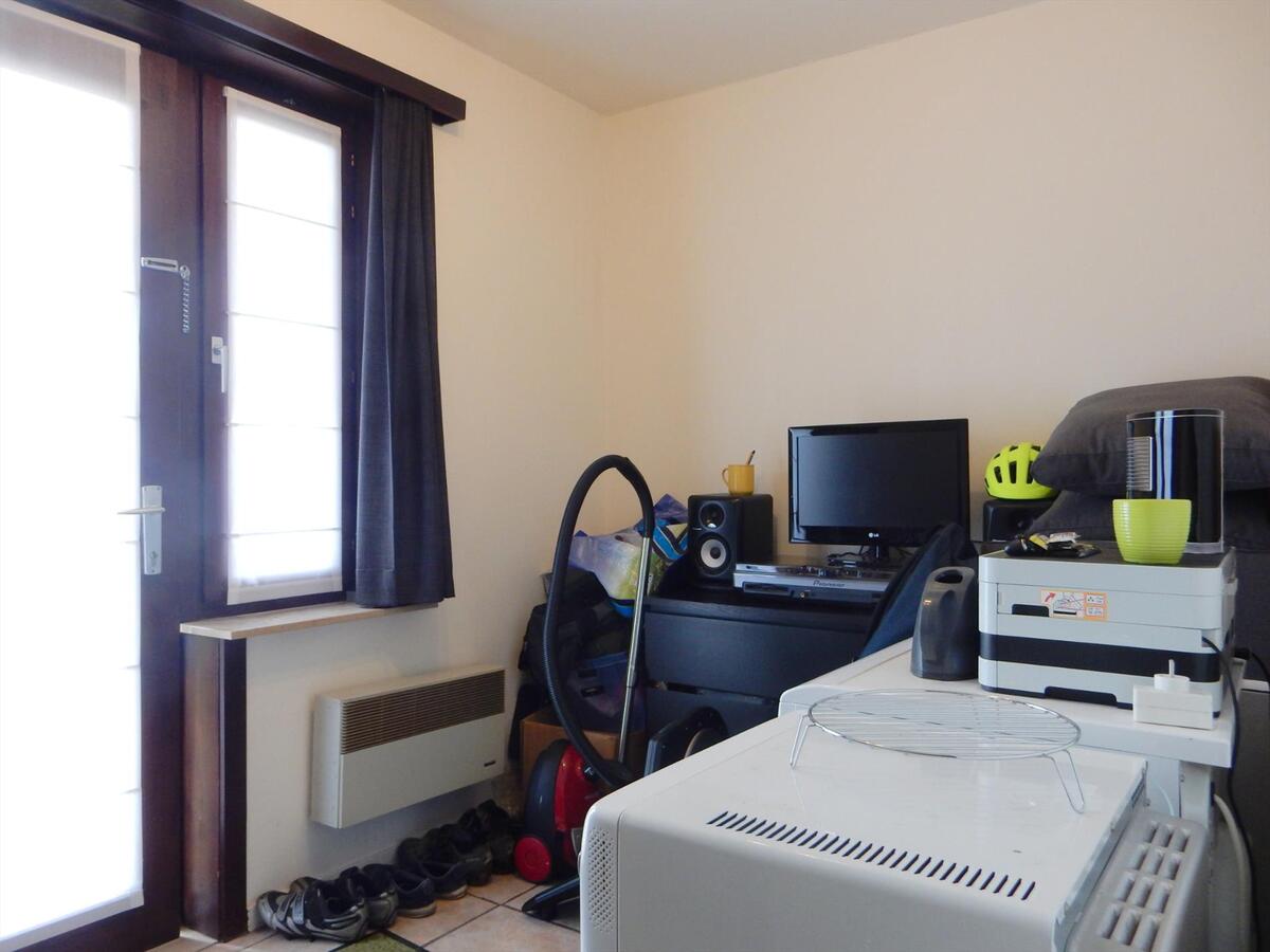 Appartement met garage en grote tuin 