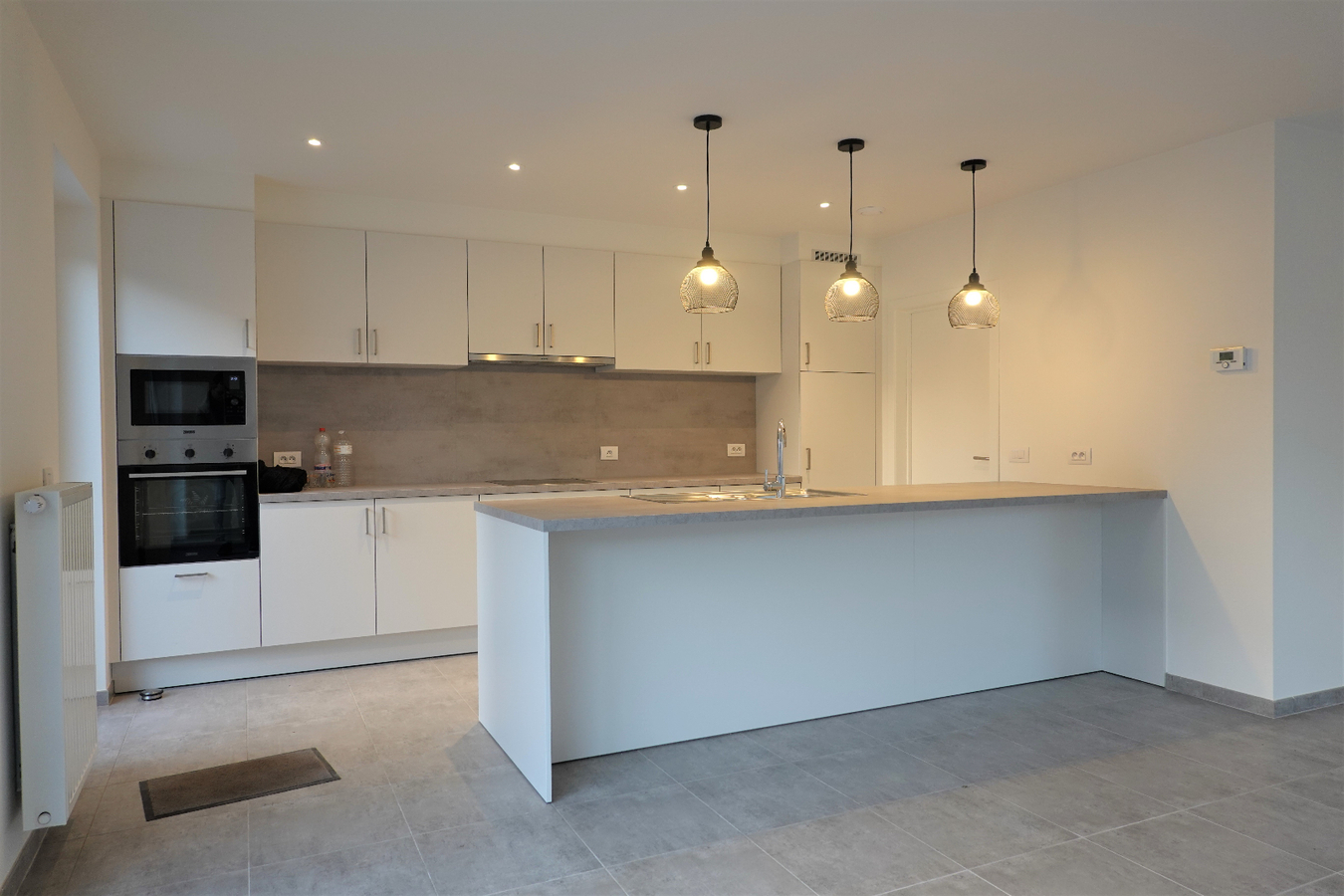 Halfopen nieuwbouw met inpandige garage 