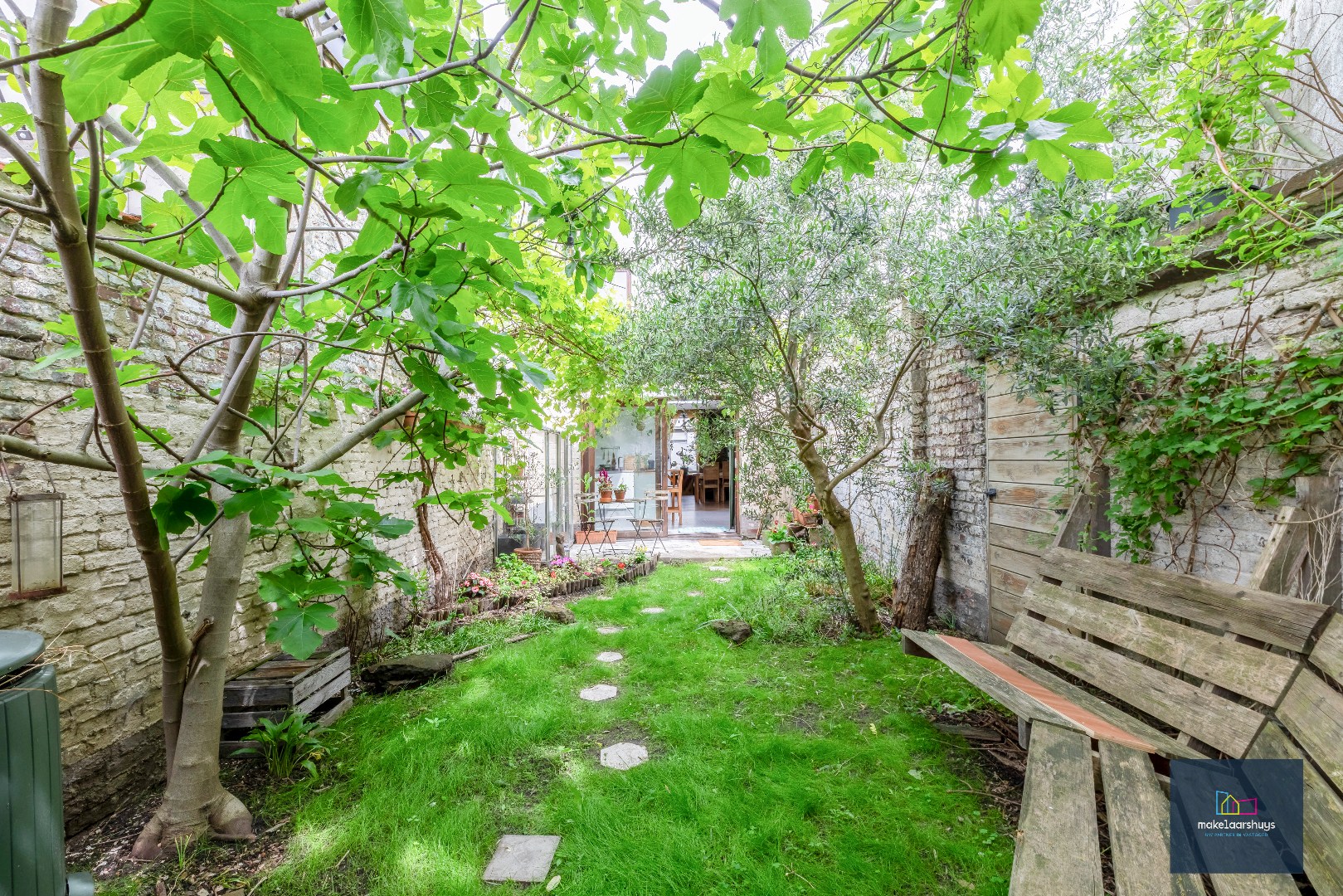 Instapklare woning met zuidgerichte tuin nabij centrum Gent 