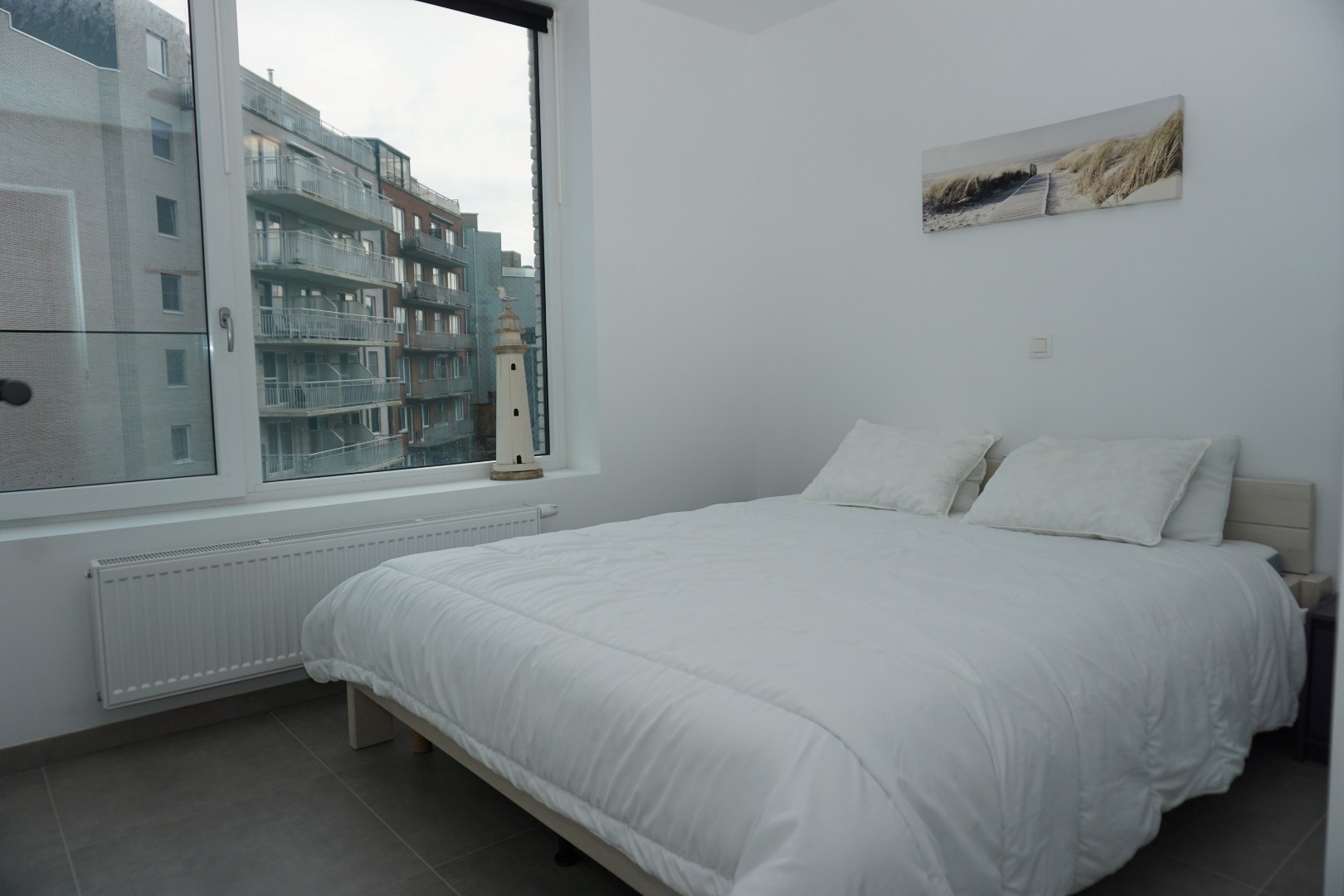 APPARTEMENT RÉCEMMENT CONSTRUIT AVEC 2 CHAMBRES ET PLACE DE PARKING PRÈS DE PETIT PARIS 