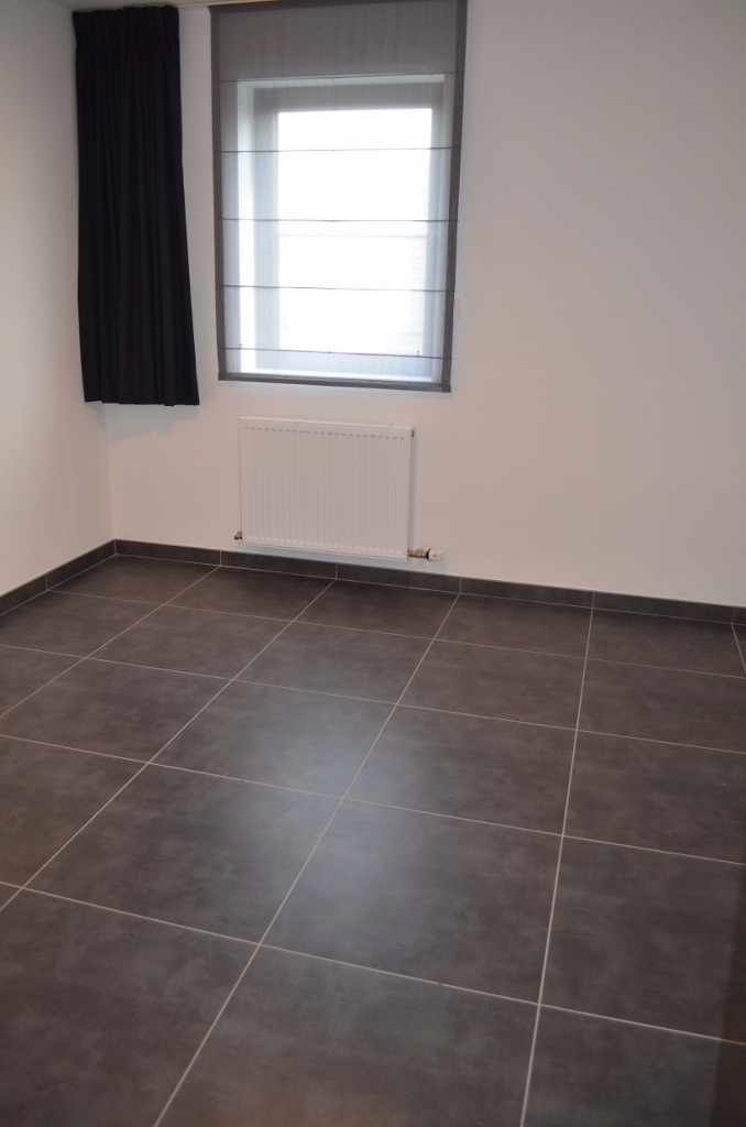 Recente halfopen bebouwing met 4 slpks en tuin te Maldegem 