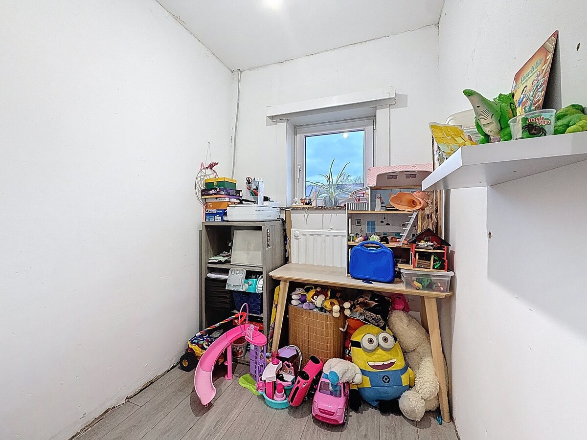 Grotendeels gerenoveerde woning met tuin te Aalst 