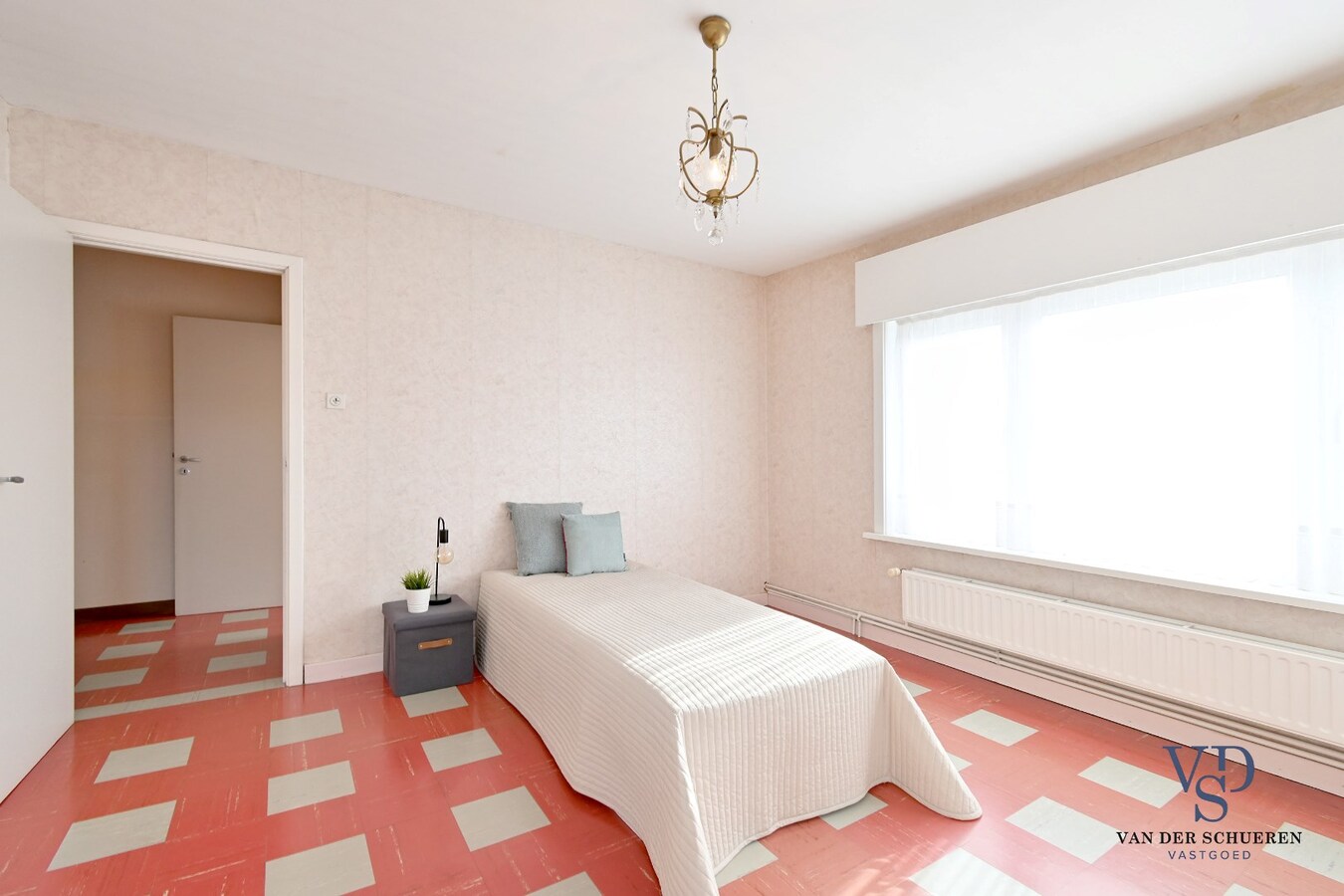 Half Open gezinswoning met potentieel 