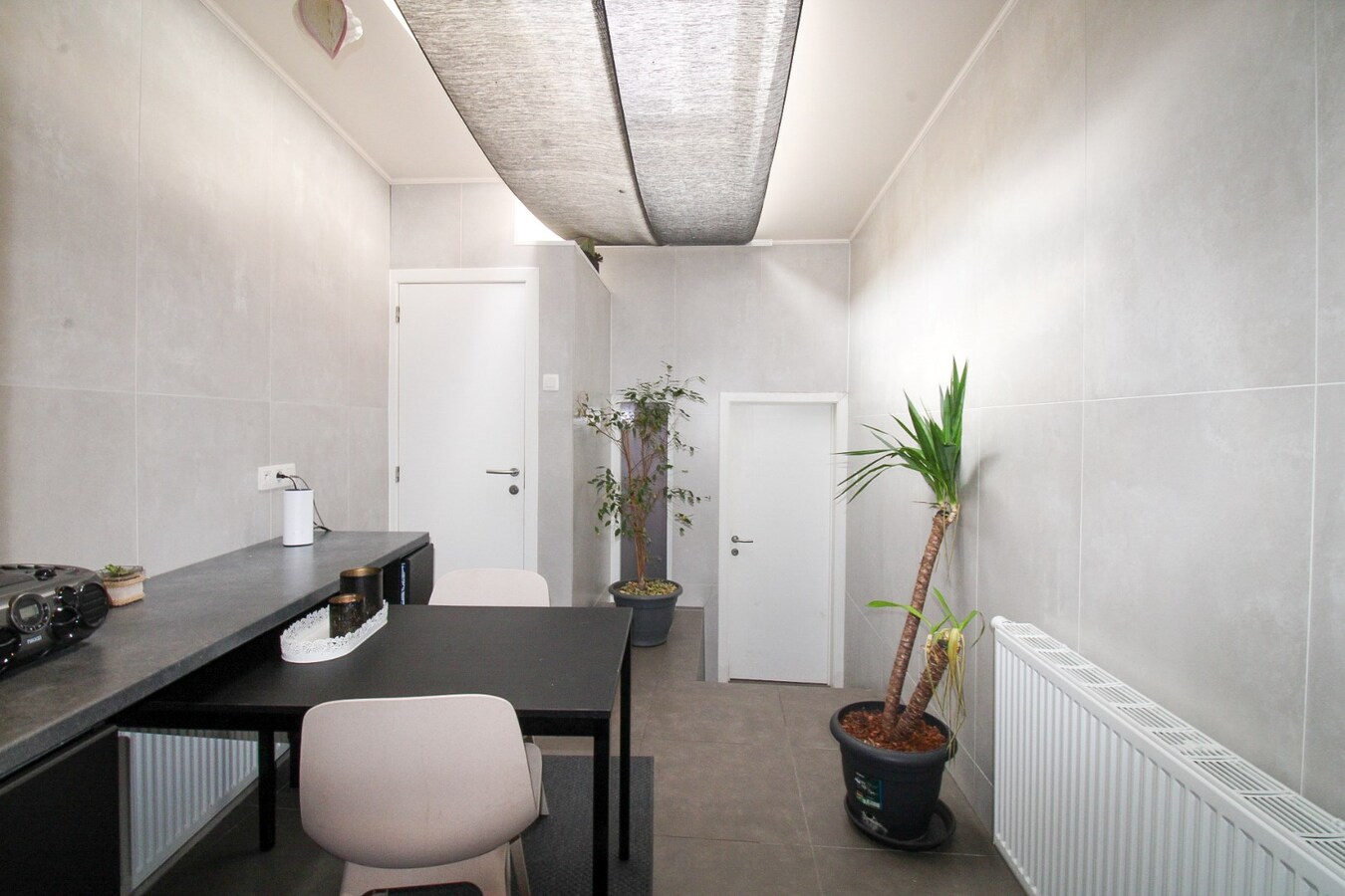 Veelzijdig handelshuis met woonst en luxueuze B&amp;B op toplocatie aan de Markt van Temse! 