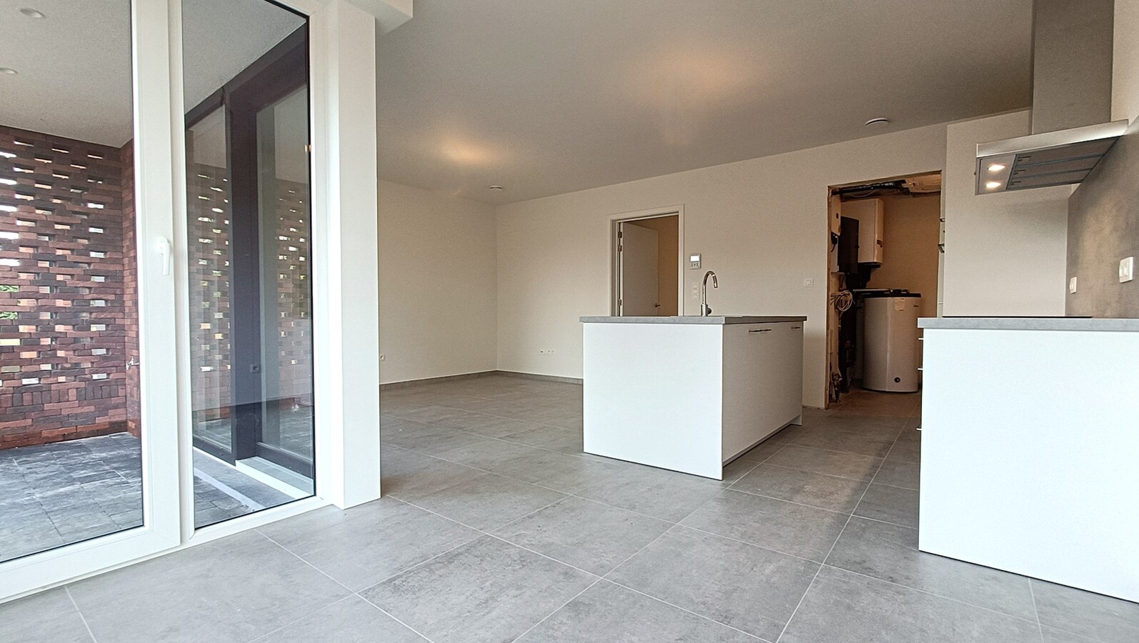 Nieuwbouwappartement met tuin en terras 