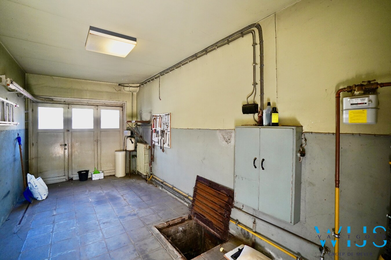 Karaktervolle en instapklare woning met uitzonderlijk perceel van 1.445 m² in hartje Ertvelde 
