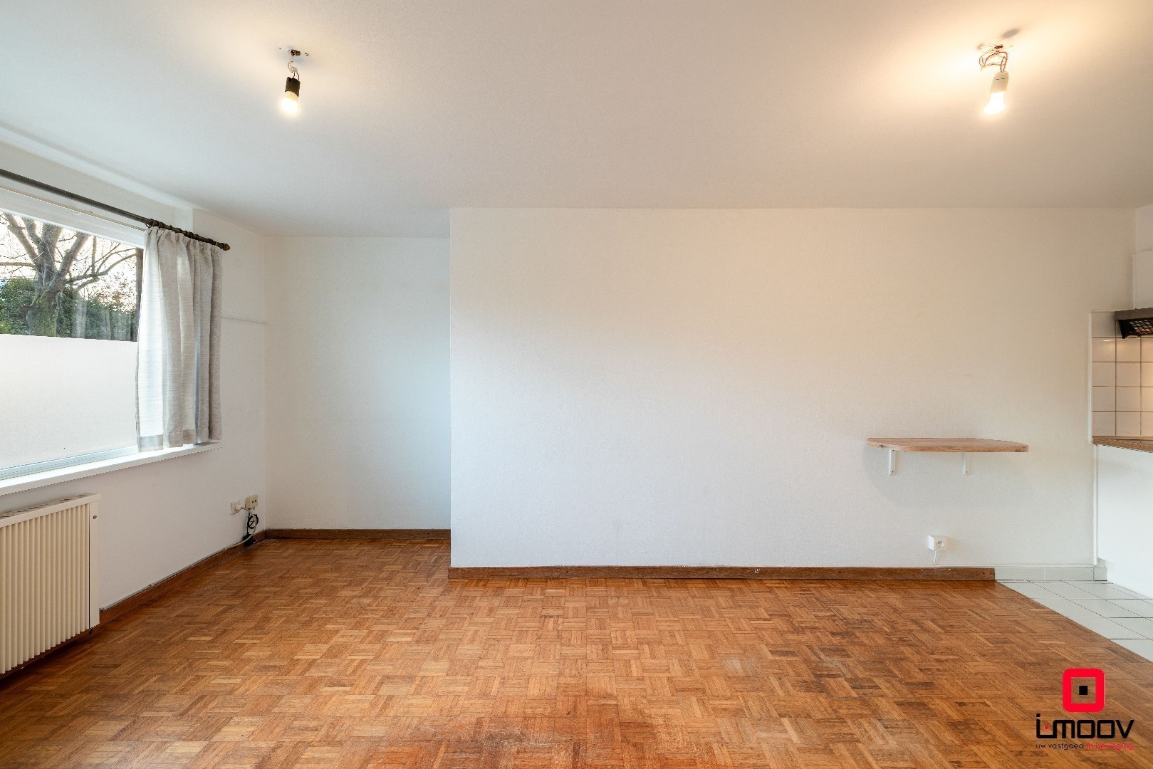 Eénslaapkamerappartement met optie voor één of twee afgesloten garageboxen op TOPLOCATIE aan Gent-Sint-Pieters 