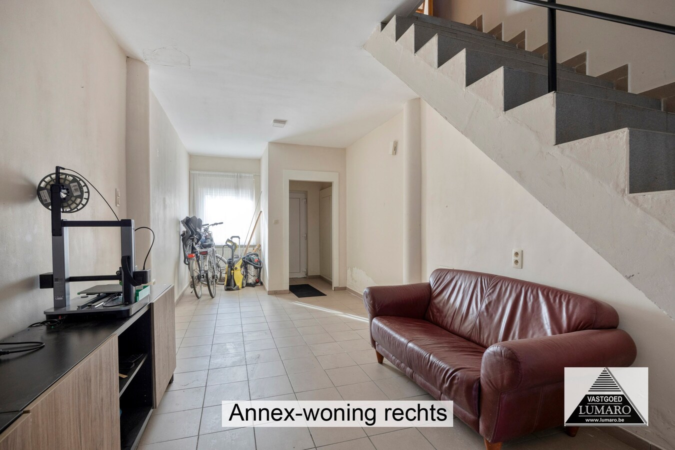 Ideale praktijk- of kangoeroewoning met tuintje en parking 