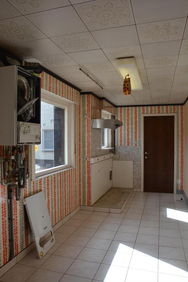 Op te knappen woning in rustige straat 