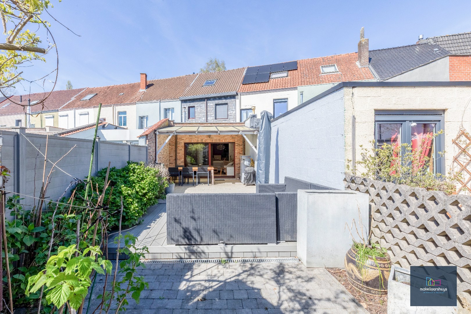 Goed onderhouden en ruime woning in rij met tuin/terras te Wondelgem 