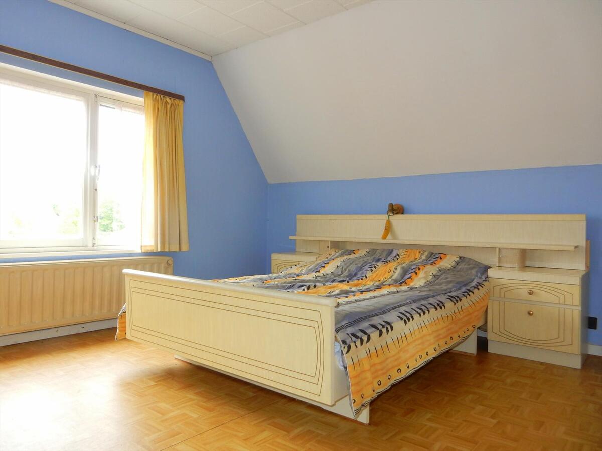 Alleenstaande woning met garage en mooie tuin 