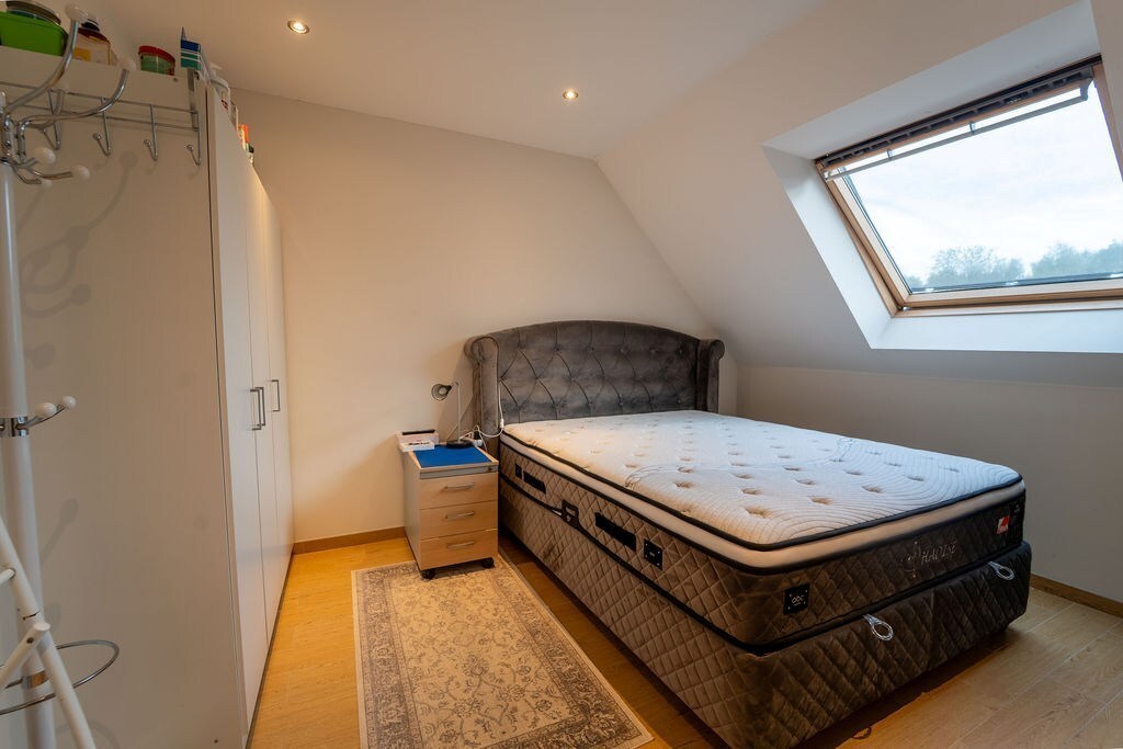 RUIME OPBRENGSTENEIGENDOM MET WOONST TE SPALBEEK (HASSELT) 