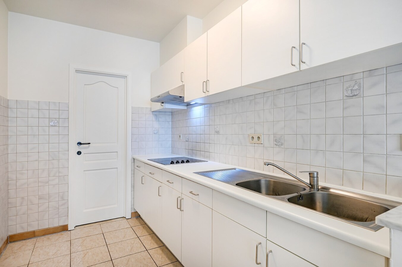 Centraal gelegen appartement met ondergrondse garage en groot terras 