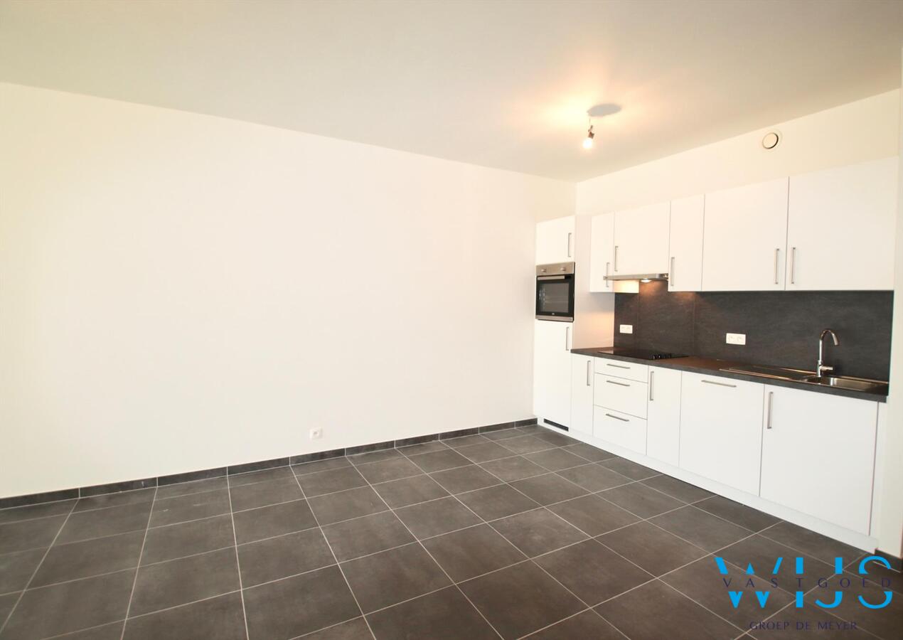 Gelijkvloers appartement met TUIN &amp; GARAGE te Zelzate! 