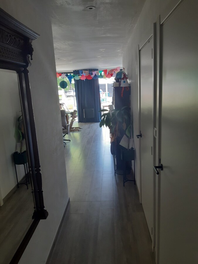 BEN-appartement met terras en tuintje. 