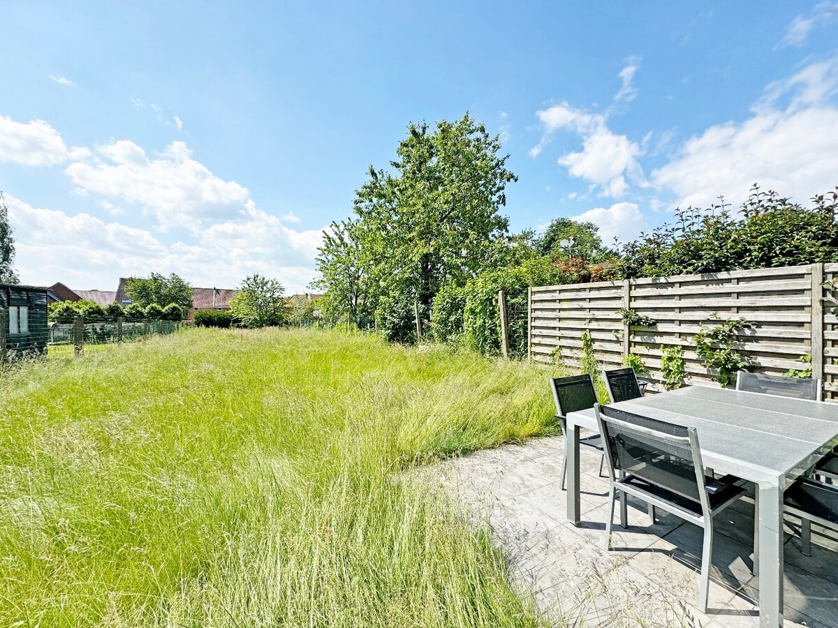 Recent (2017) gelijkvloers appartement met grote tuin te Ophasselt 