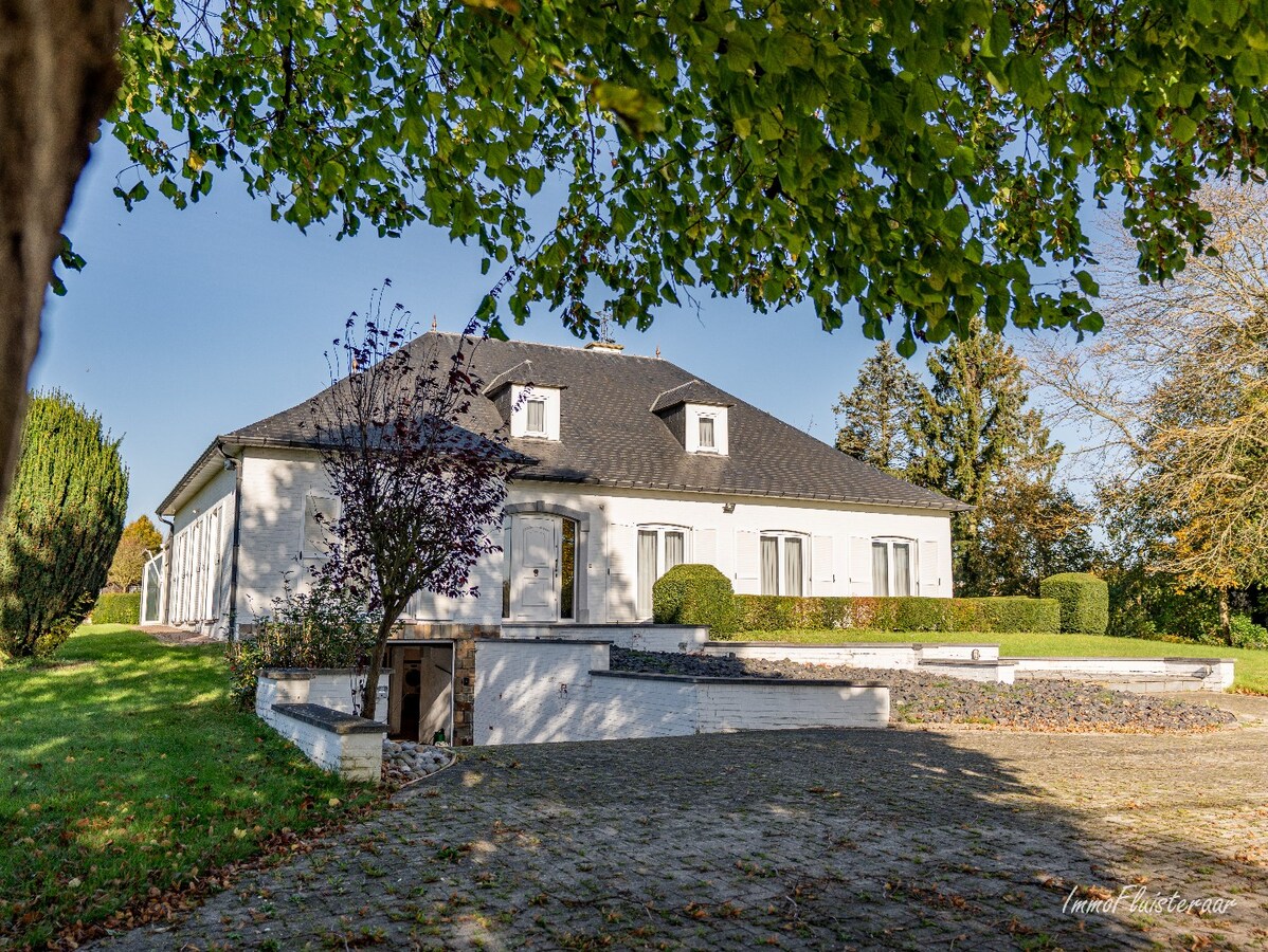 Rural villa with multifunctional outbuilding on approximately 51 acres in Bilzen 