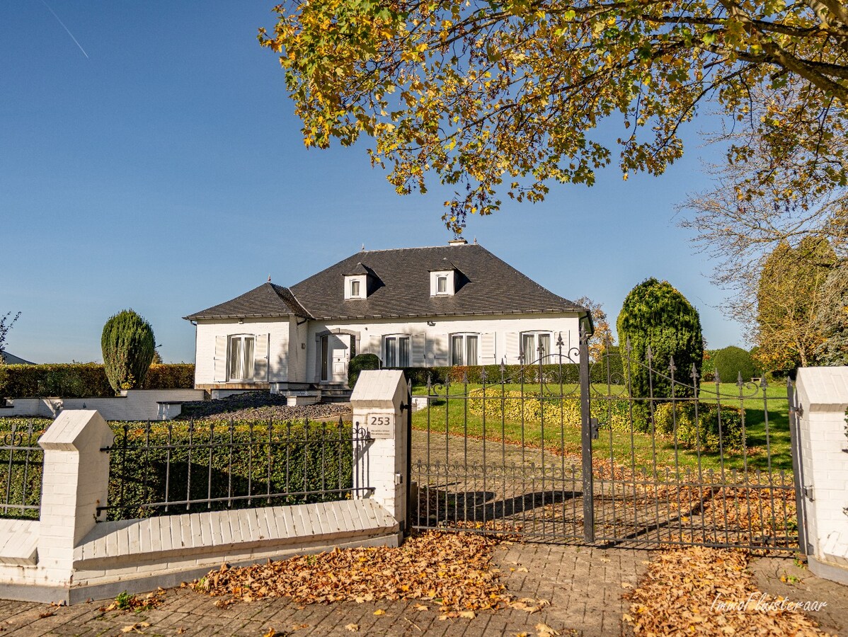 Rural villa with multifunctional outbuilding on approximately 51 acres in Bilzen 