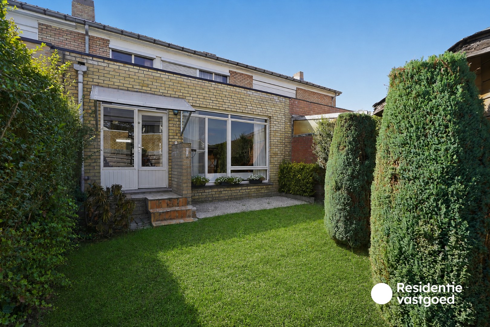 Instapklare bel-étagewoning met garage en tuin in Sint-Michiels 
