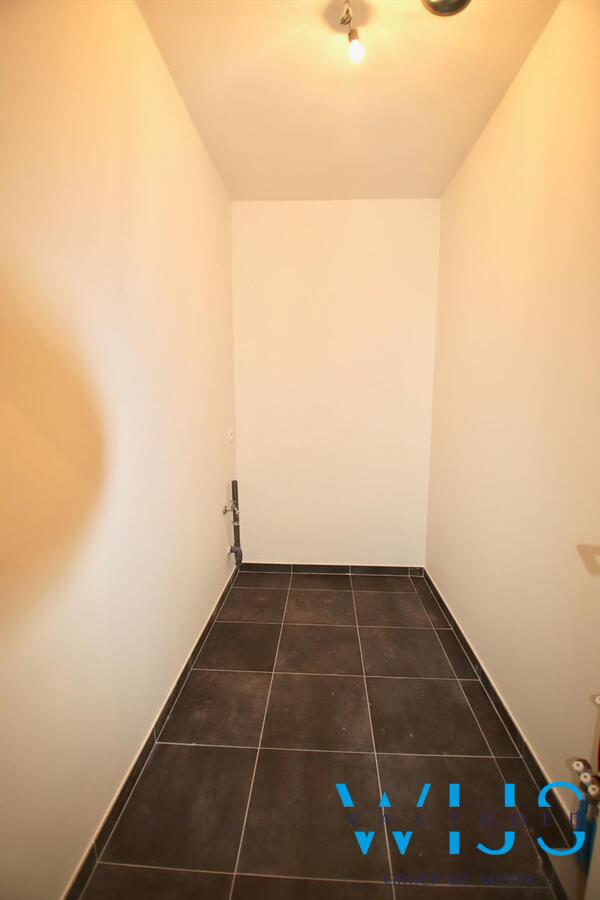 Gelijkvloers appartement met TUIN &amp; GARAGE te Zelzate! 