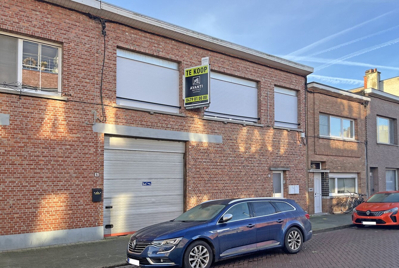 2 appartementen met gelijkvloers  magazijn 