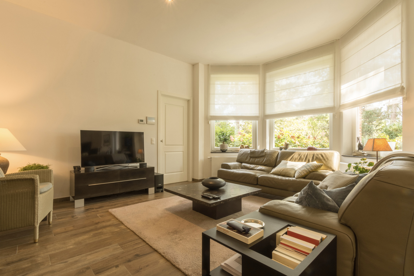 Gelijkvloers luxe 2-slk-appartement met privatieve tuin. 