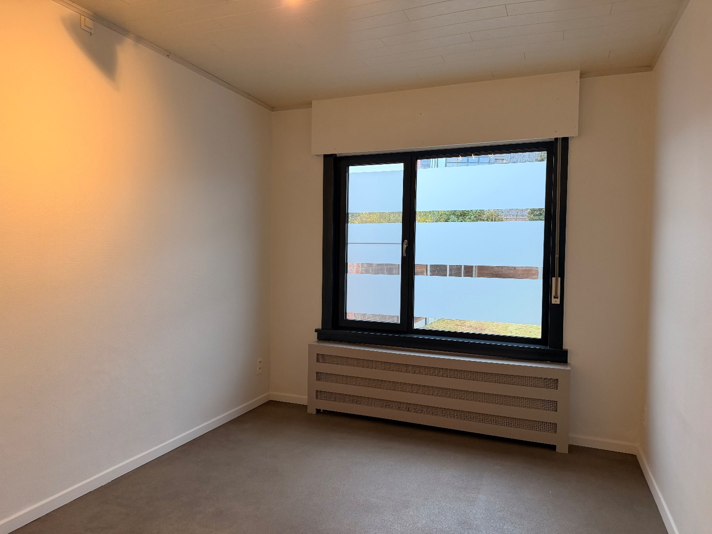 Verzorgd gelijkvloers appartement met tuin 
