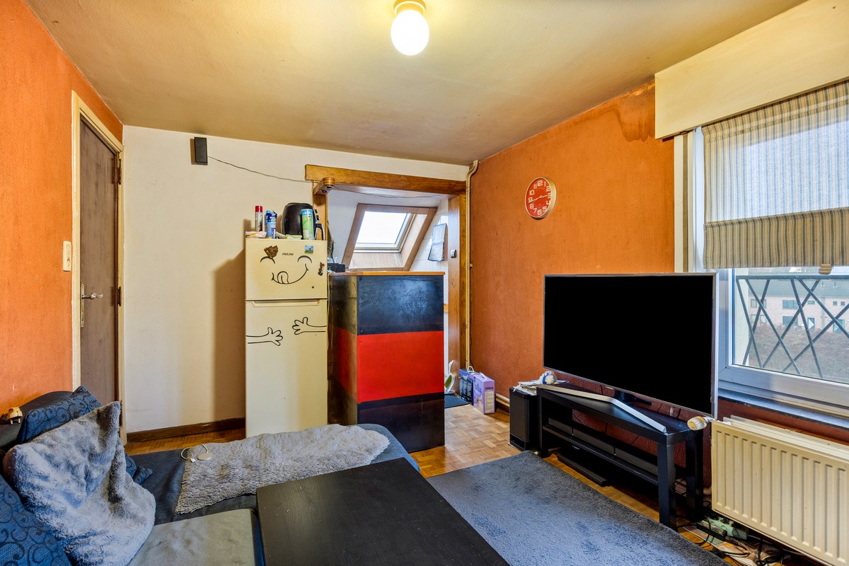 Opbrengsteigendom met handelspand en 3 appartementen te koop in Heverlee op een super ligging! 