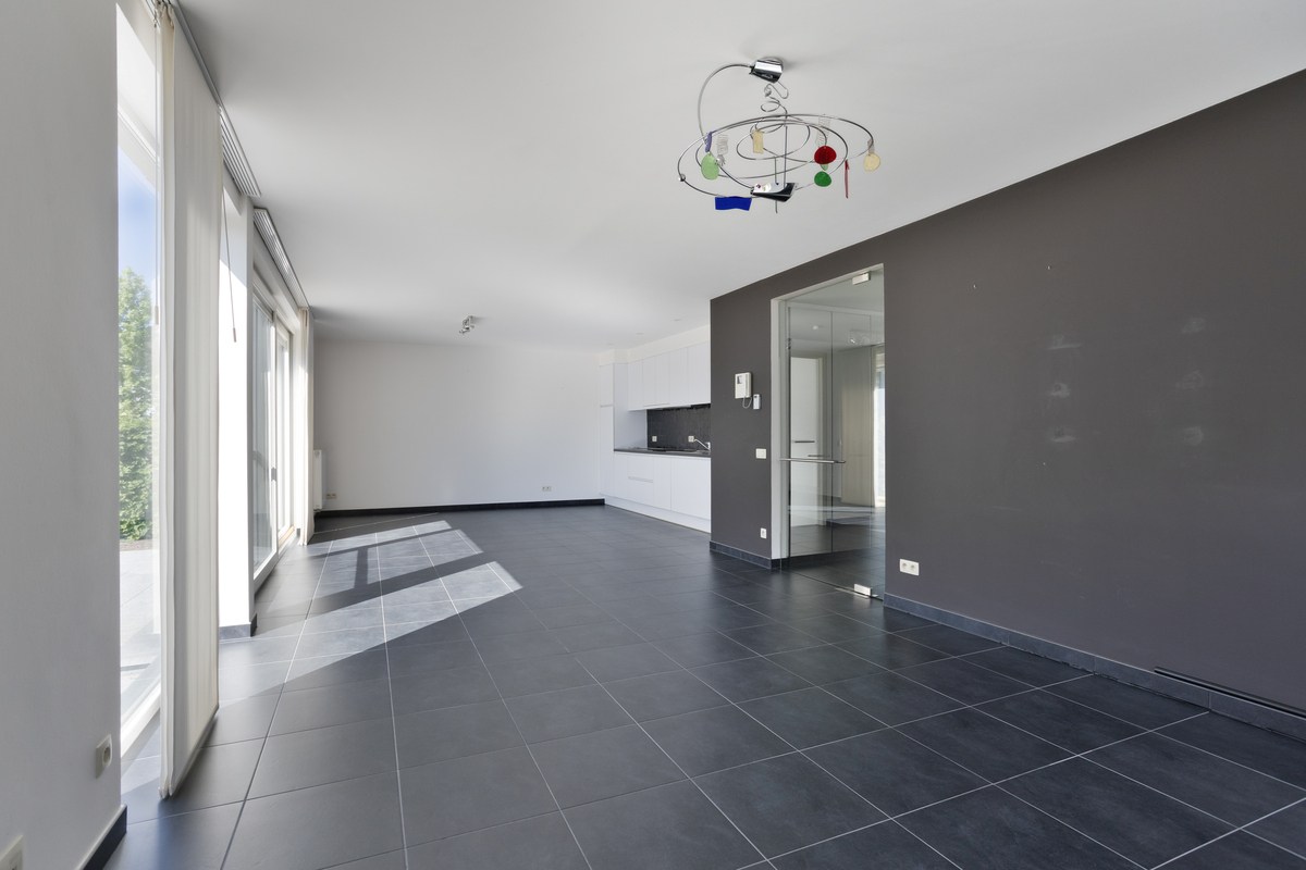 Instapklaar gelijkvloers appartement met groot terras, tuin en garagebox in Kumtich - EPC 104 KWH/m² 