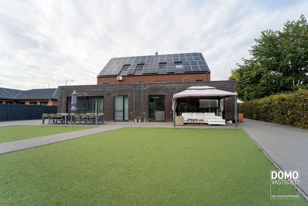 Gunstig gelegen handelshuis te Spalbeek (Hasselt) 