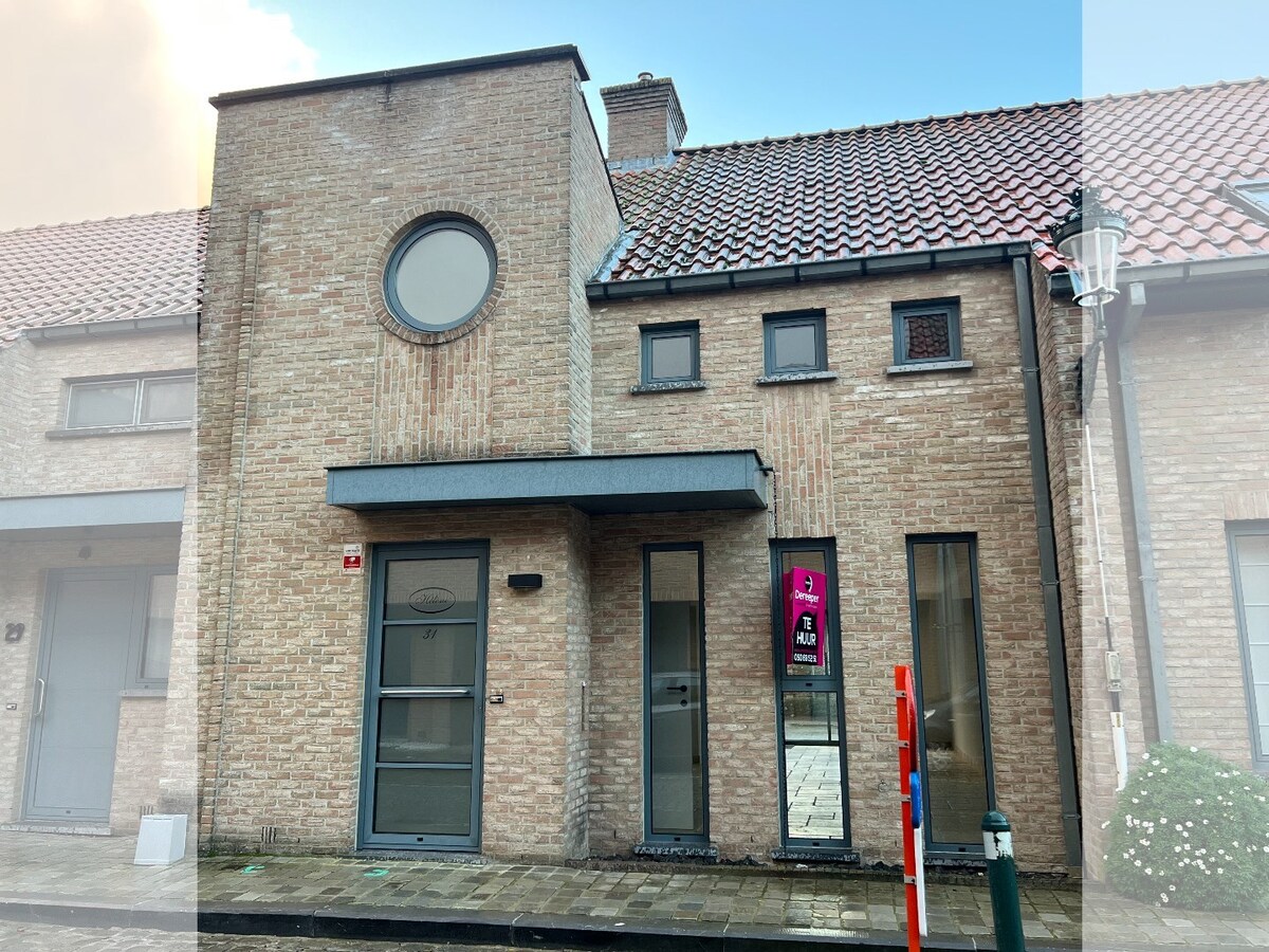 Gerenoveerde stadswoning op uitstekende ligging met binnentuin en garagebox 