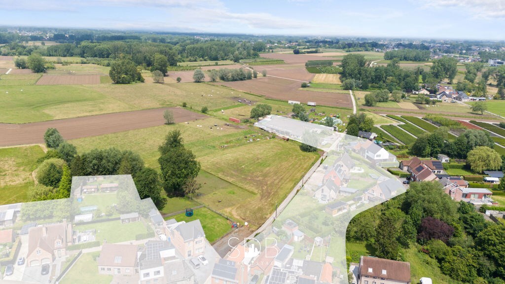 Bouwgrond met gezinstuin en aanpalend grasland op 7.598m² 