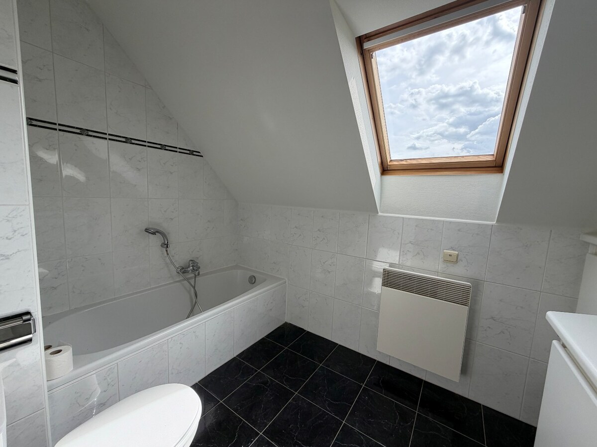 Ruim appartement met 2 terrassen nabij de Schelde. 