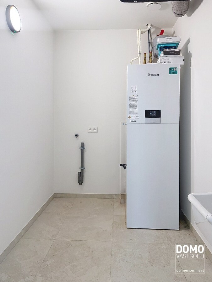 HOOGWAARDIG AFGEWERKT APPARTEMENT VAN 122,50 M² MET 2 SLAAPKAMERS, RUIM TERRAS EN PARKEERPLAATS TE CENTRUM TUILT 