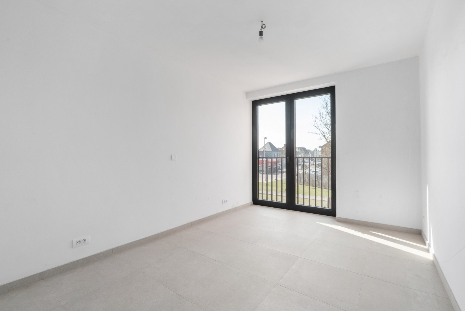 Nieuwbouwappartement met één slaapkamer, terras en ondergrondse autostaanplaats te koop in Zulte 