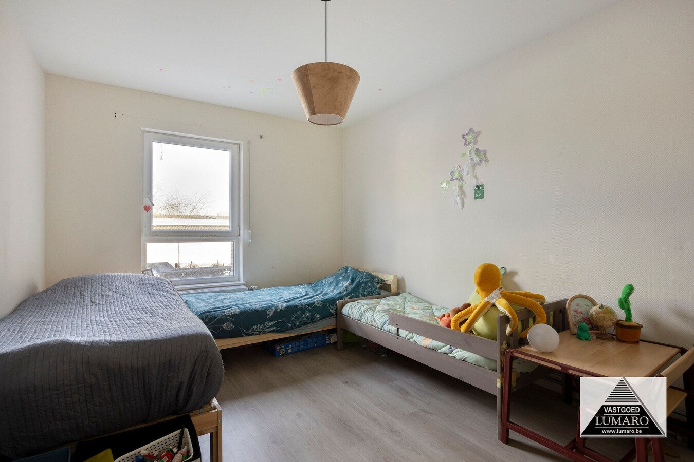 Ideale praktijk- of kangoeroewoning met tuintje en parking 