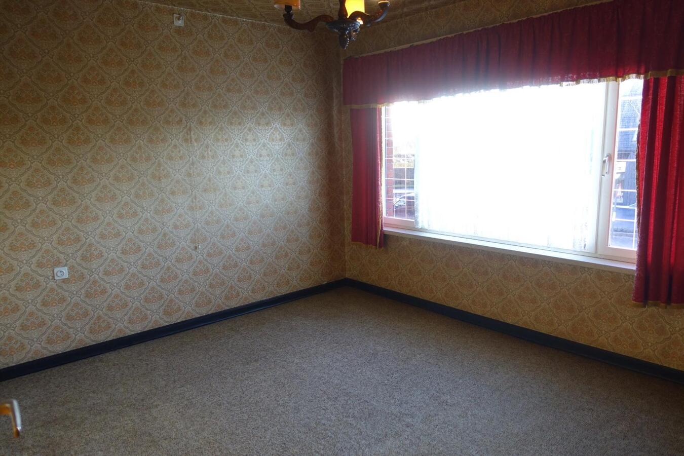 Degelijke halfopen woning met garage 