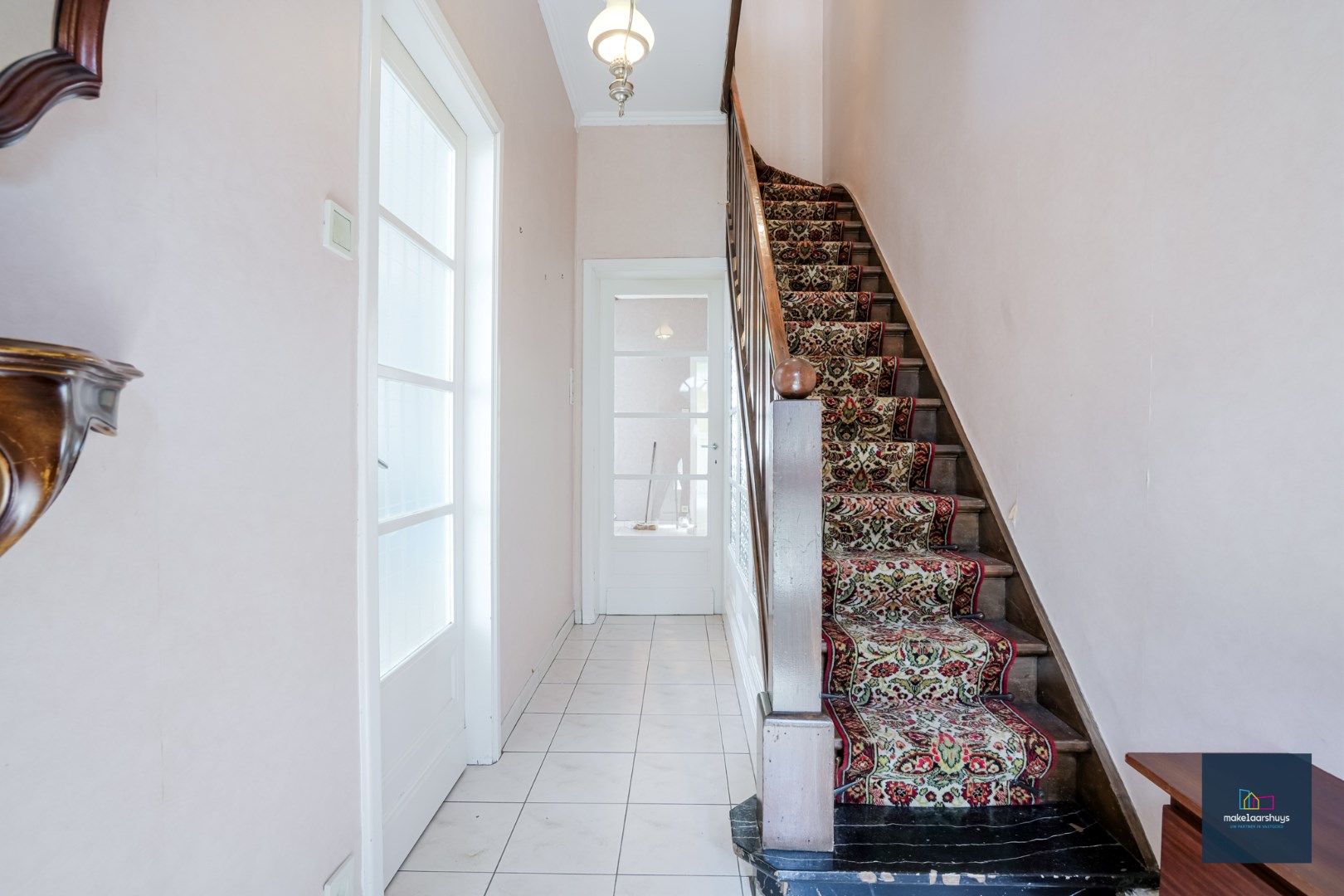 Centraal gelegen te renoveren woning in rij met tuin te Mariakerke 