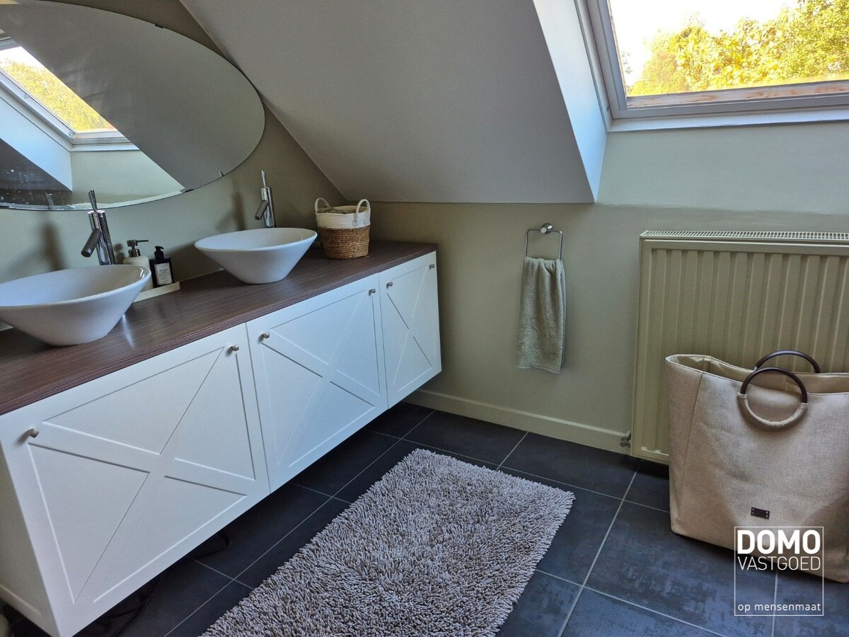 Warme gezinswoning met prachtige tuin in hartje Kortessem 