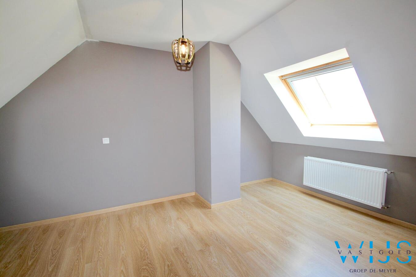 Gezellige 2 slaapkamerduplex mét garage 