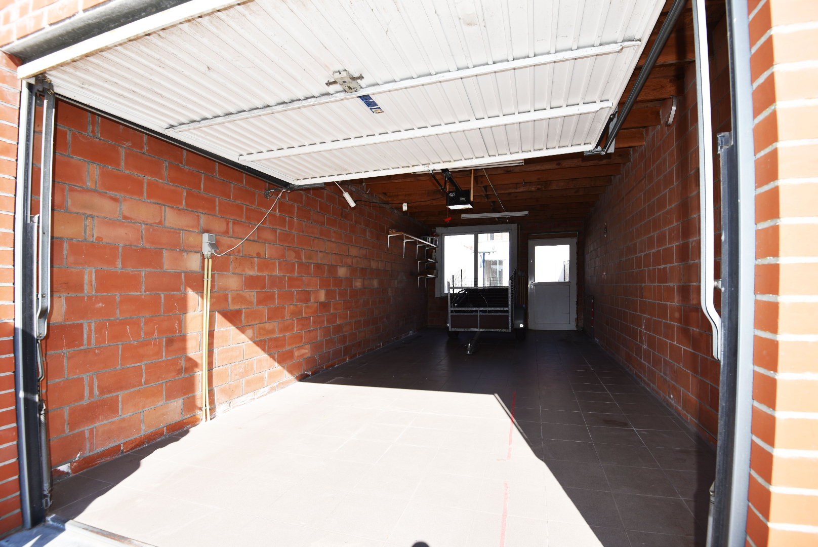 Rijwoning met 4 slpks én garage in centrum Eeklo 