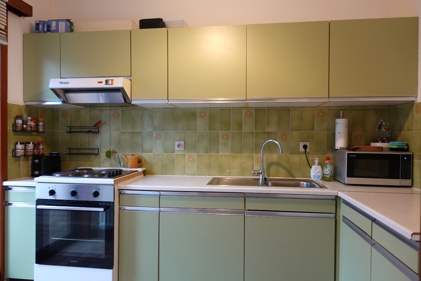 Opbrengsteigendom met 5 appartementen, 2 studio's en 4 garageboxen in Gistel 