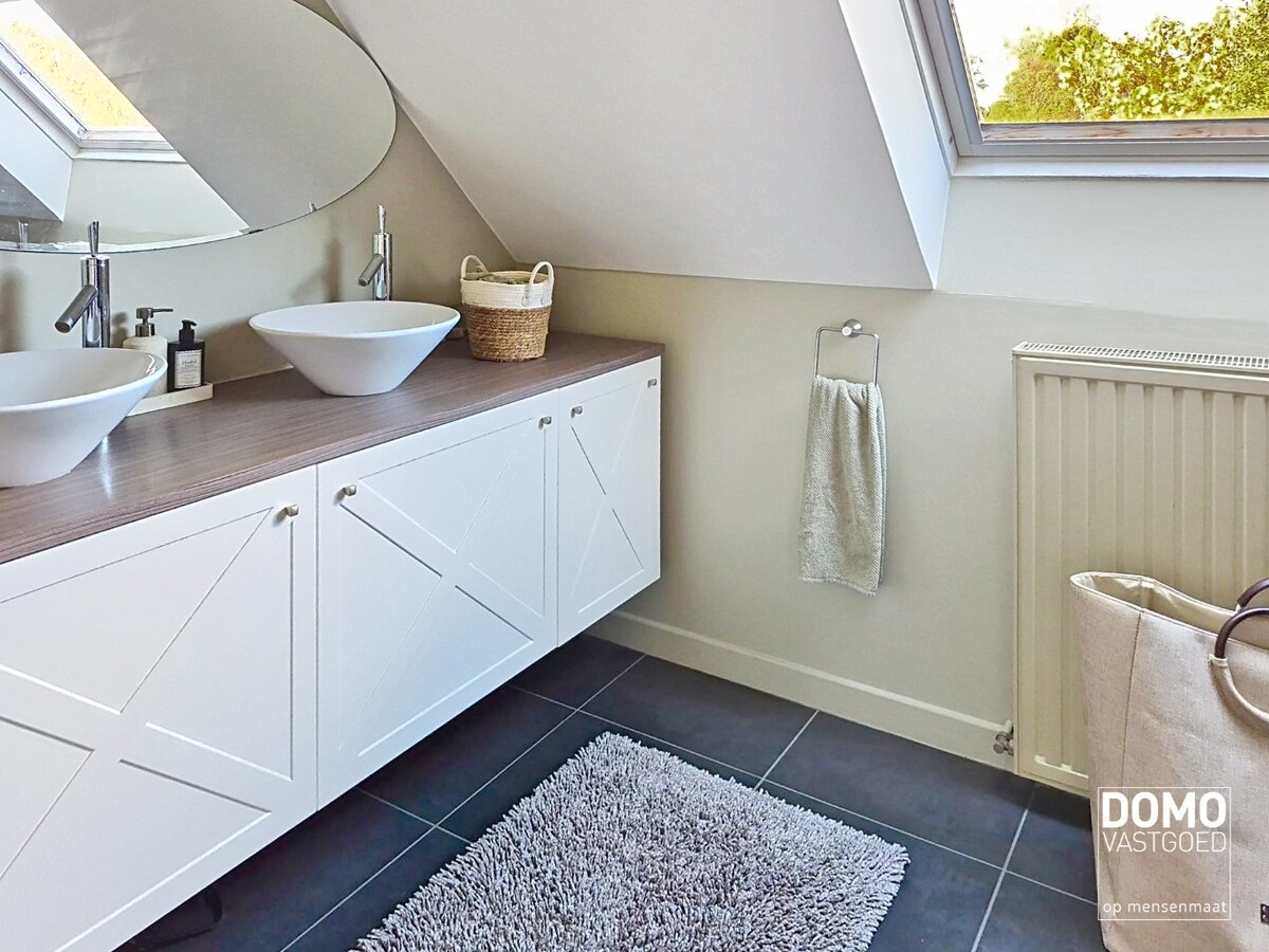 Warme gezinswoning met prachtige tuin in hartje Kortessem 