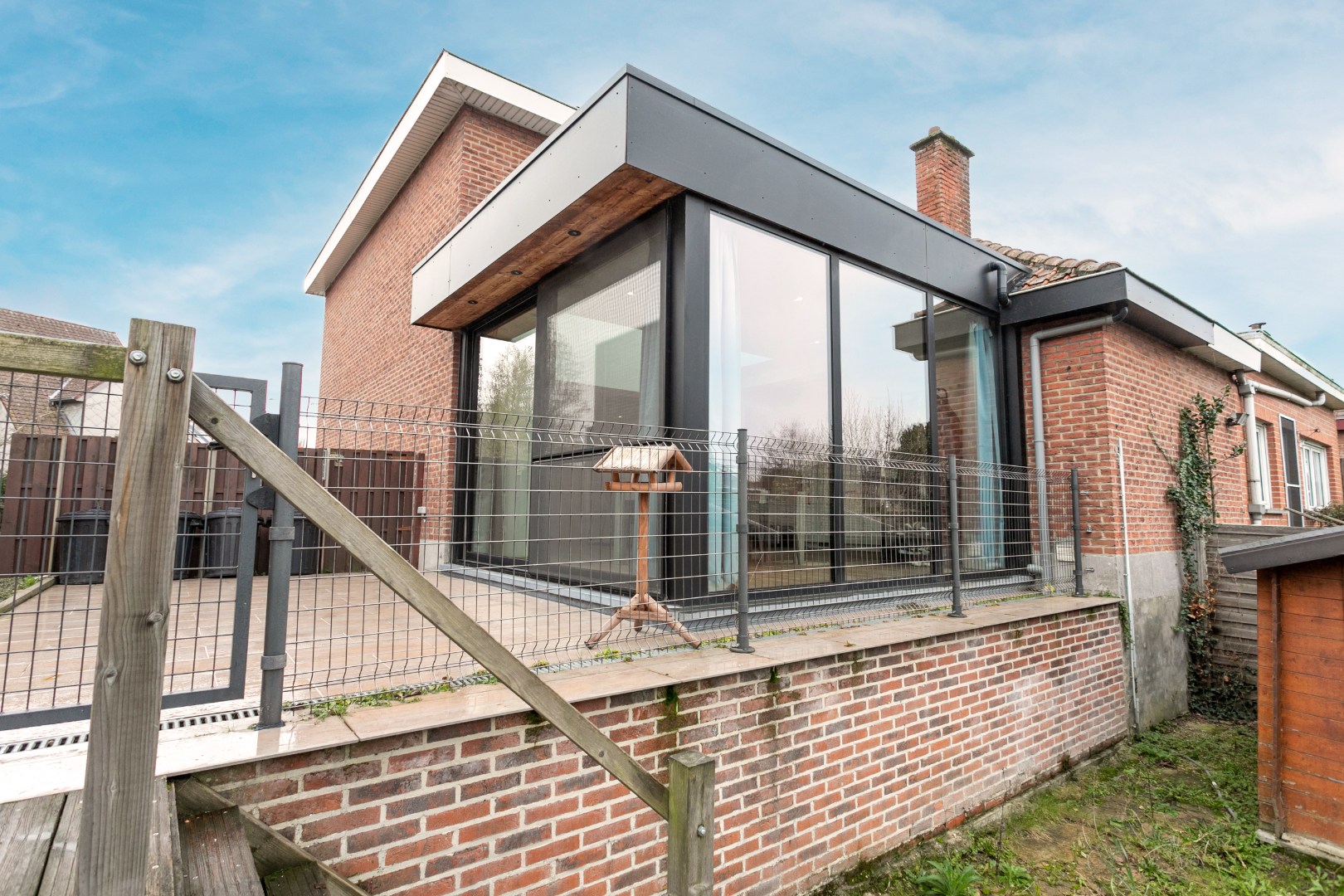 Rustig gelegen halfopen woning met 3 slpks en tuin te Buizingen 